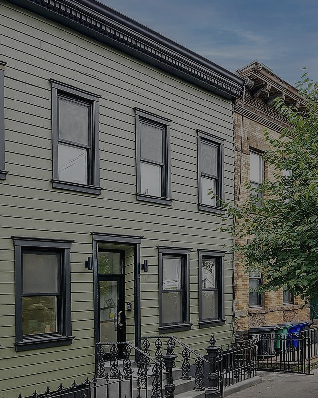 Clapboard row house in Brooklyn